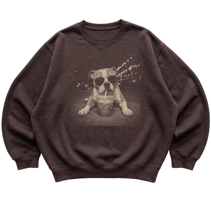 American Bulldog wearing aviator sunglasses and drinking iced coffee on a Dark Chocolate Gildan Heavy Blend Crewneck Sweatshirt, flat lay view