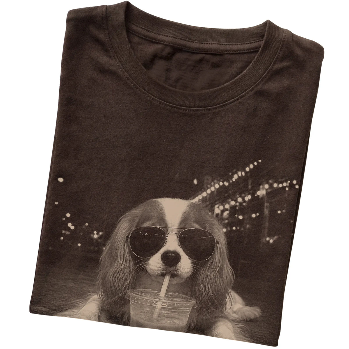 Cavalier King Charles Spaniel wearing aviator sunglasses and drinking iced coffee on a Dark Chocolate Gildan Softstyle T-Shirt, folded view