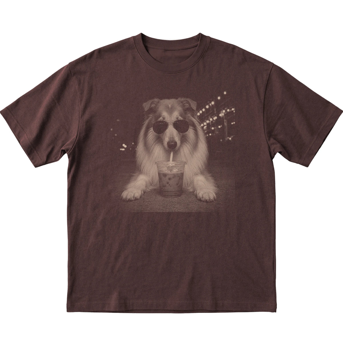 Collie wearing aviator sunglasses and drinking iced coffee on a Dark Chocolate Gildan Softstyle T-Shirt, flat lay view