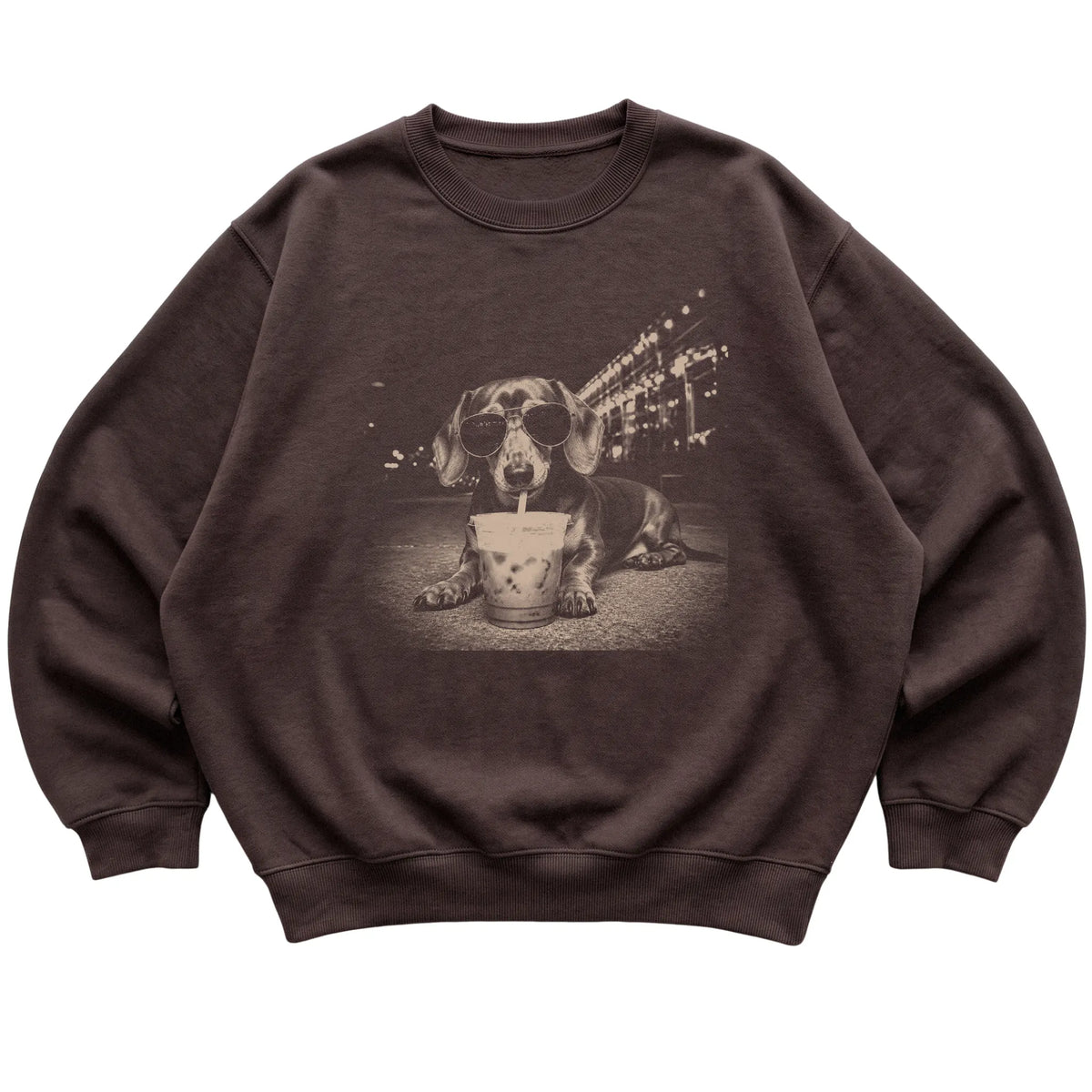 Dachshund wearing aviator sunglasses and drinking iced coffee on a Dark Chocolate Gildan Heavy Blend Crewneck Sweatshirt, flat lay view