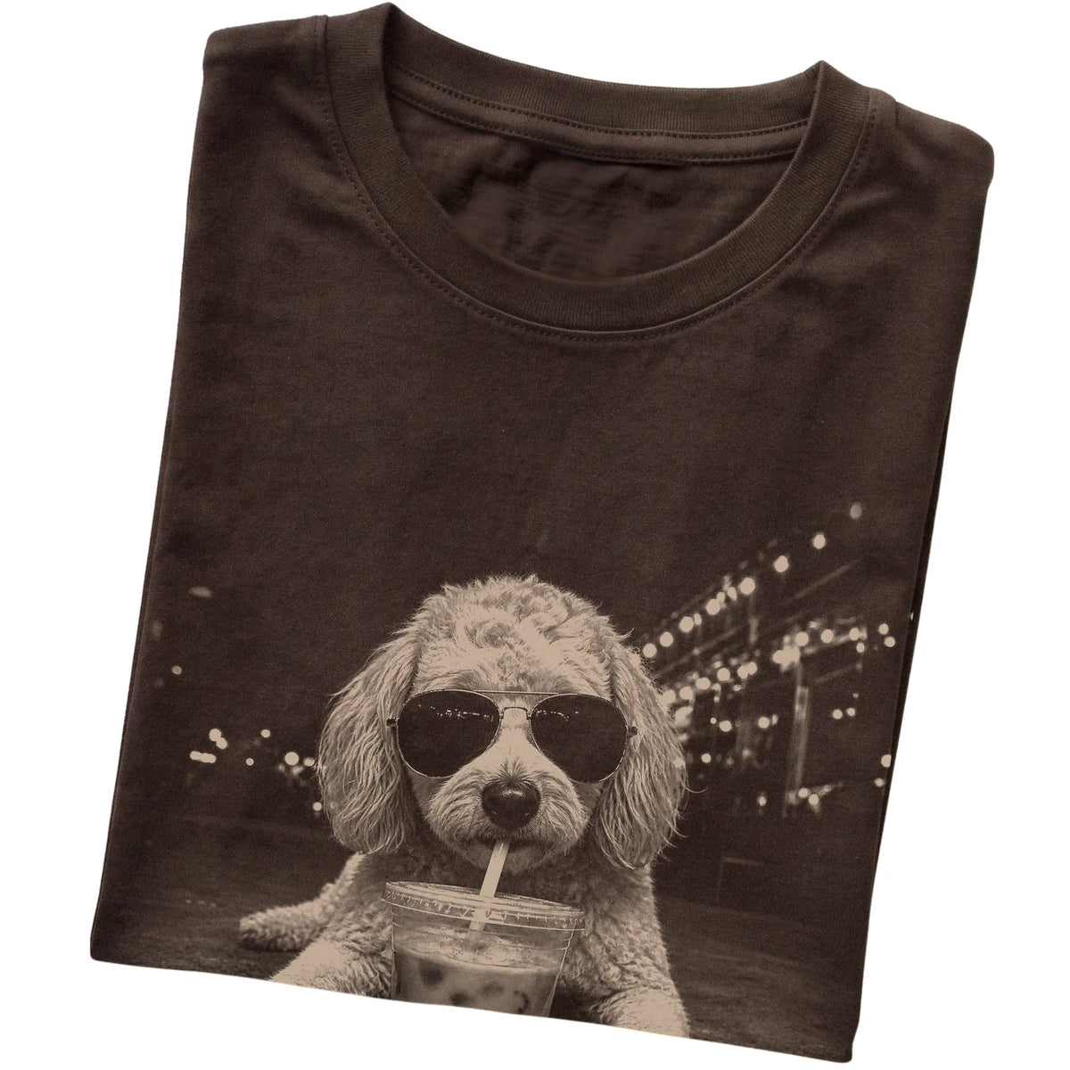 Goldendoodle wearing aviator sunglasses and drinking iced coffee on a Dark Chocolate Gildan Softstyle T-Shirt, folded view