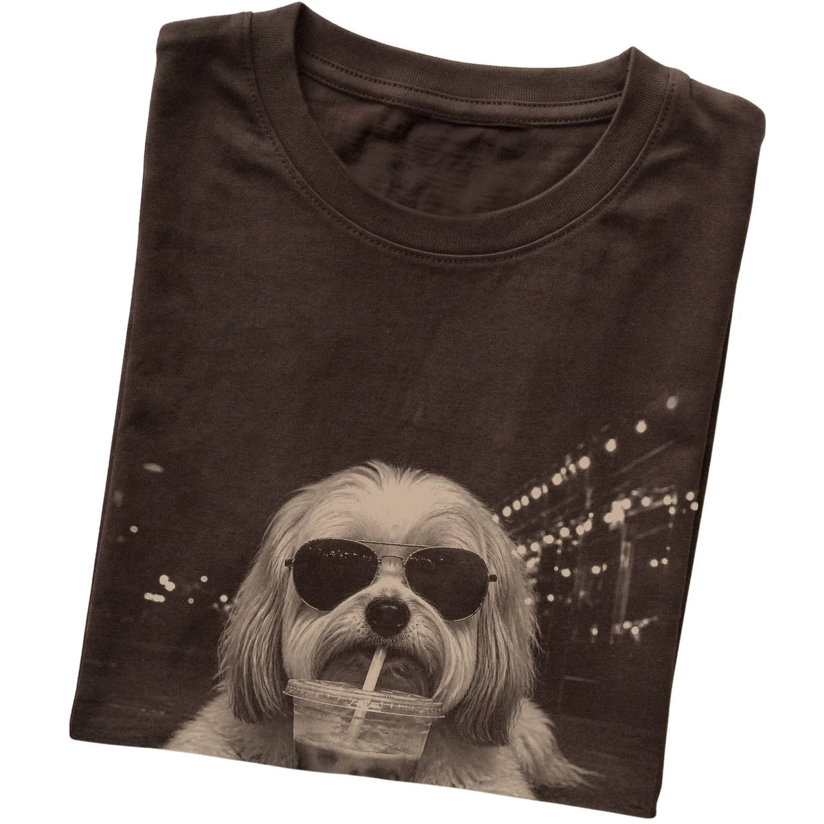 Havanese wearing aviator sunglasses and drinking iced coffee on a Dark Chocolate Gildan Softstyle T-Shirt, folded view