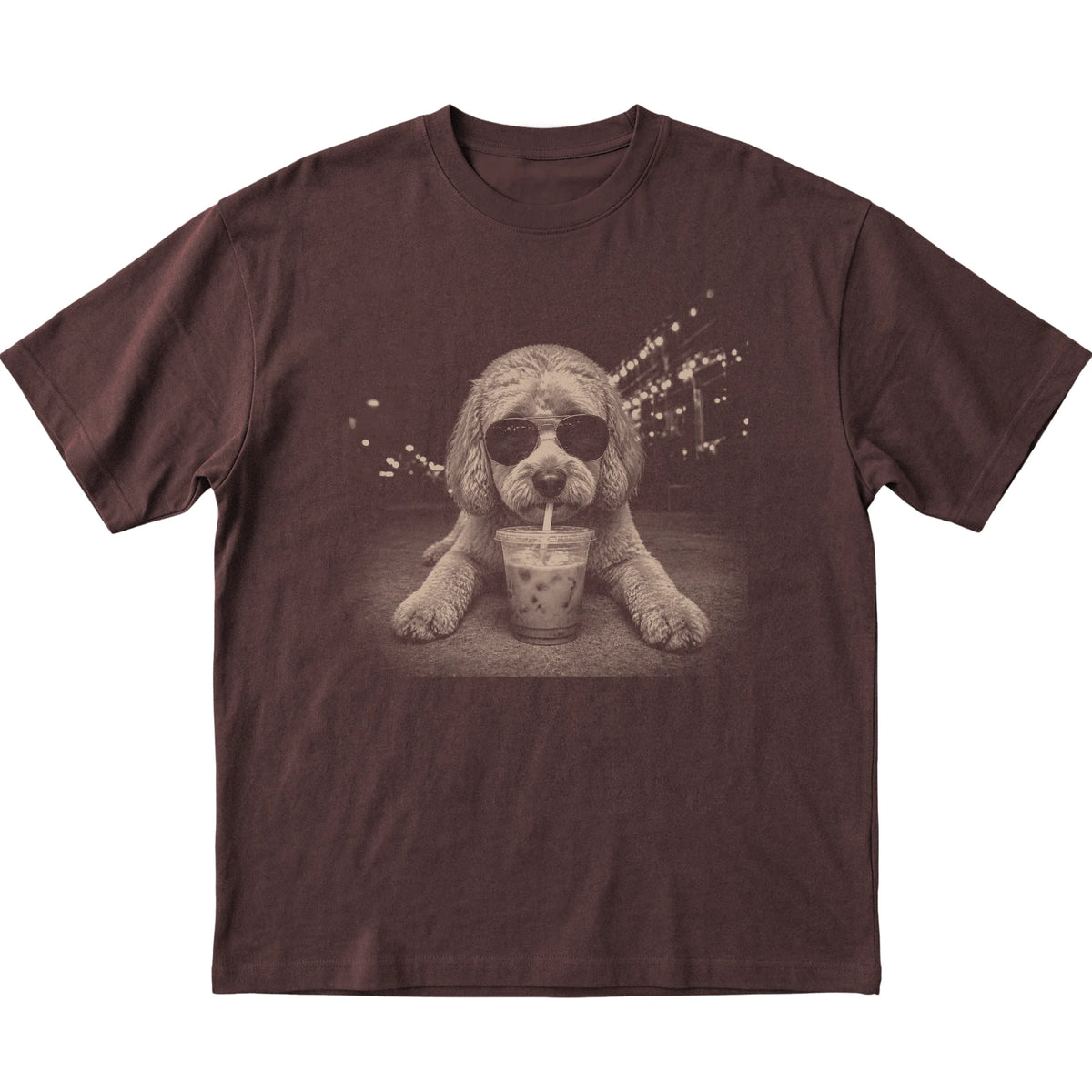 Labradoodle wearing aviator sunglasses and drinking iced coffee on a Dark Chocolate Gildan Softstyle T-Shirt, flat lay view
