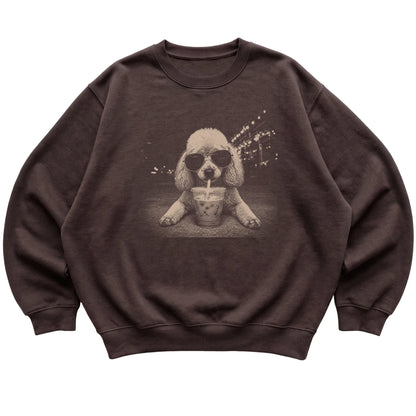 Poodle wearing aviator sunglasses and drinking iced coffee on a Dark Chocolate Gildan Heavy Blend Crewneck Sweatshirt, flat lay view
