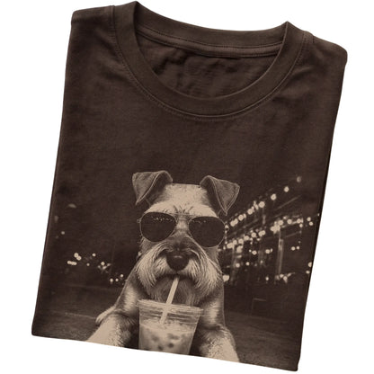 Schnauzer wearing aviator sunglasses and drinking iced coffee on a Dark Chocolate Gildan Softstyle T-Shirt, folded view