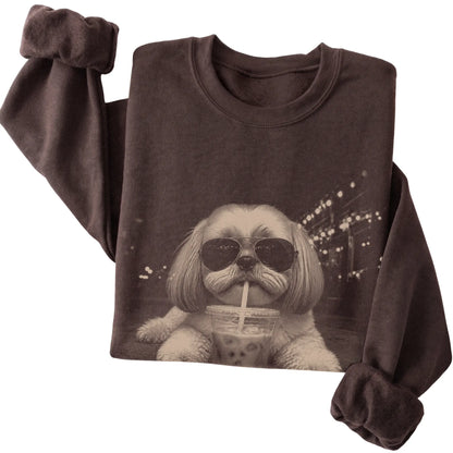 Shih Tzu wearing aviator sunglasses and drinking iced coffee on a Dark Chocolate Gildan Heavy Blend Crewneck Sweatshirt, folded view