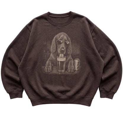 Dark Chocolate Irish Setter drinking from a pint at a bar, laid flat