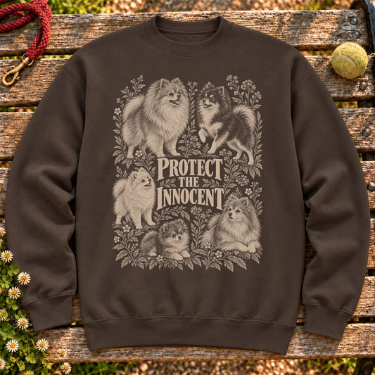 Protect the Innocent Pomeranian design on a Dark Chocolate sweatshirt