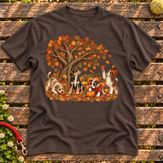 Four Rescue Mixed Breed puppies with pumpkins beneath an autumn tree on a Dark Chocolate softstyle T-shirt