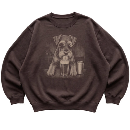 Dark Chocolate Schnauzer drinking from a pint at a bar, laid flat