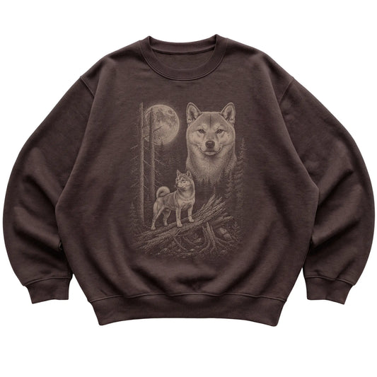 Shiba Inu Moonlit Forest graphic on a dark chocolate crewneck sweatshirt laid flat