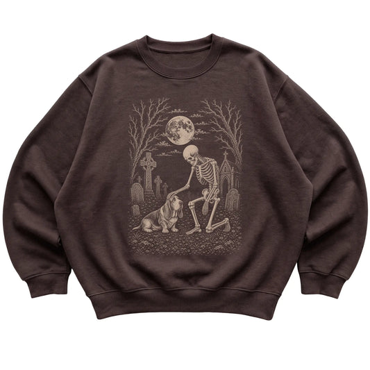 Skeleton petting a Basset Hound in a graveyard on a Dark Chocolate sweatshirt
