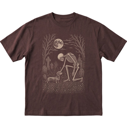 Skeleton petting a Dachshund in a graveyard on a Dark Chocolate T-shirt