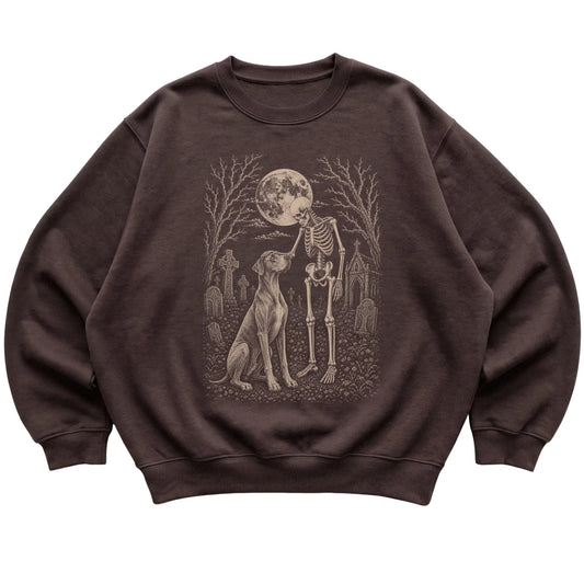 Skeleton petting a Great Dane in a graveyard on a Dark Chocolate sweatshirt