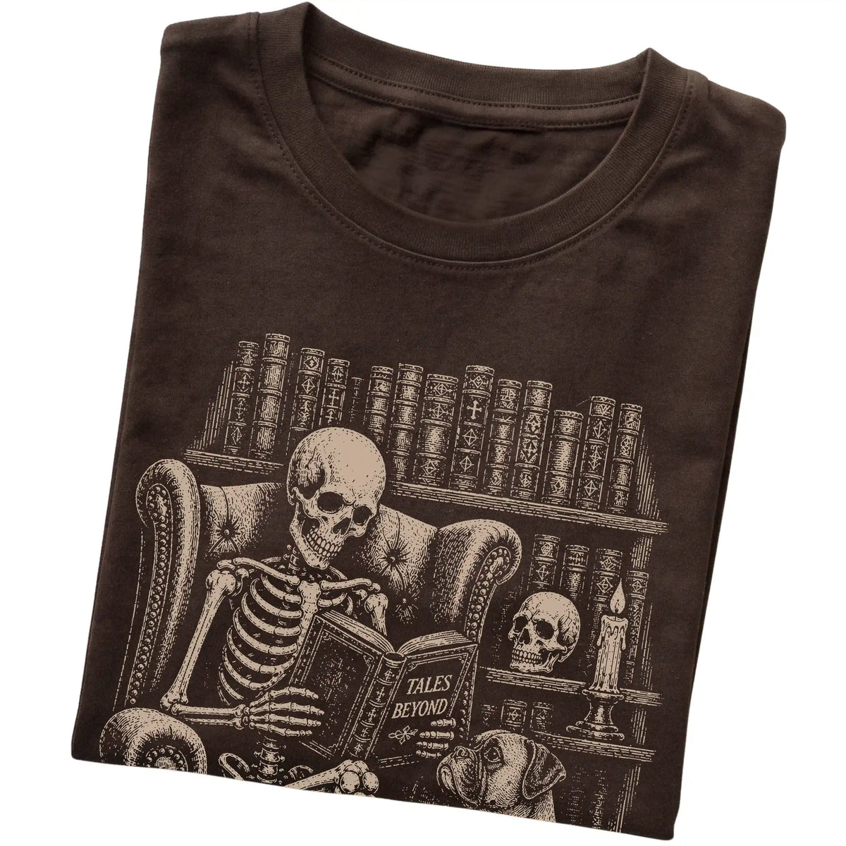 Folded Dark Chocolate T-shirt with a skeleton reading Tales Beyond to a Boxer