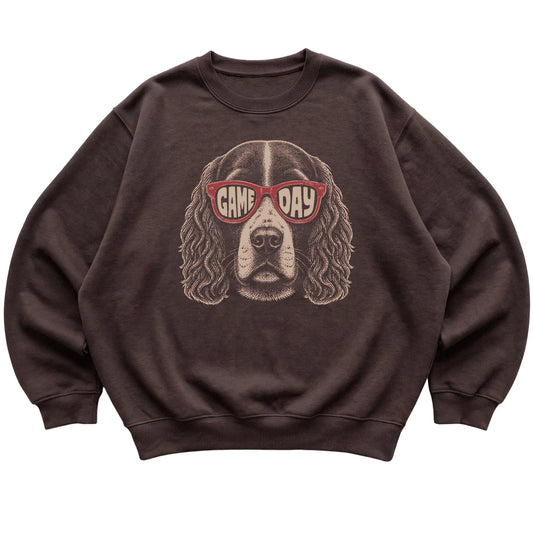 Springer Spaniel Game Day design on a Dark Chocolate sweatshirt, flat lay