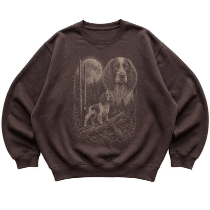 Springer Spaniel Moonlit Forest graphic on a dark chocolate crewneck sweatshirt laid flat