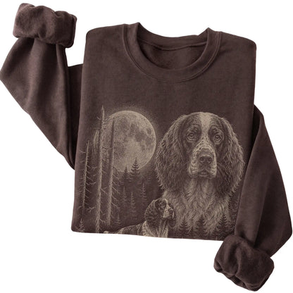 Folded dark chocolate crewneck sweatshirt showing the Springer Spaniel Moonlit Forest graphic