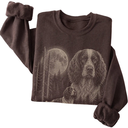 Folded dark chocolate crewneck sweatshirt showing the Springer Spaniel Moonlit Forest graphic