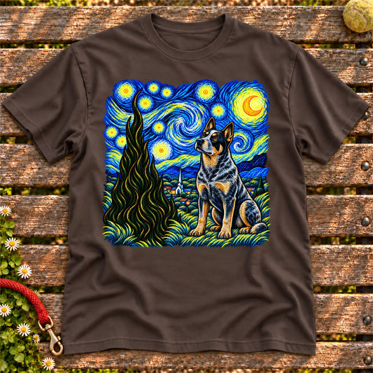 Colorful Blue Heeler beneath a swirling starry night sky on a Dark Chocolate T-shirt