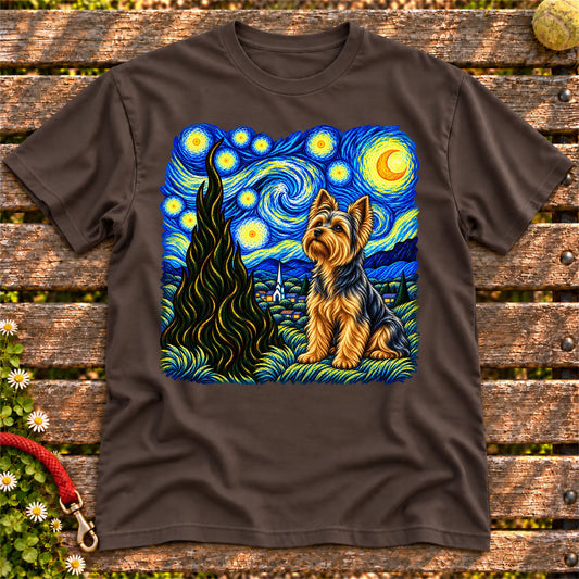 Colorful Yorkie beneath a swirling starry night sky on a Dark Chocolate T-shirt