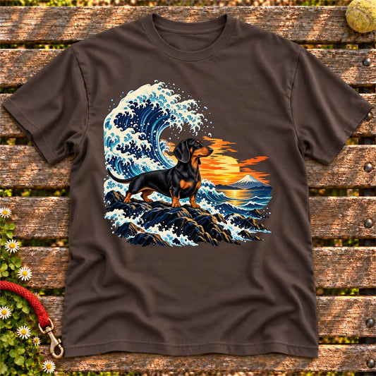 Dachshund dog with ocean waves, sunset and Mount Fuji on a Dark Chocolate Gildan T-shirt