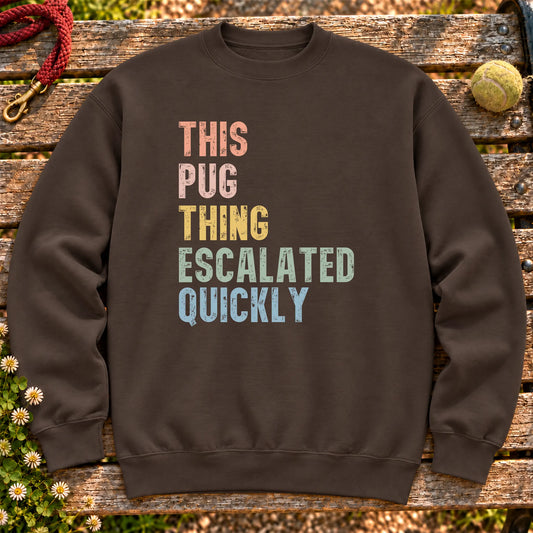 “This Pug thing escalated quickly” text on a Dark Chocolate sweatshirt