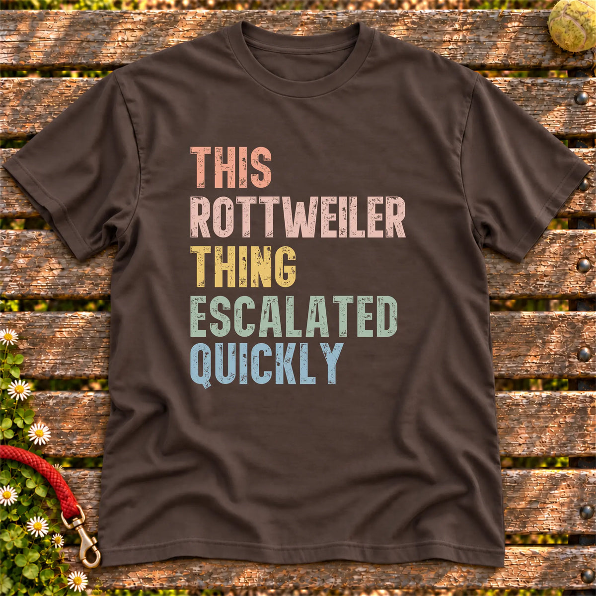 “This Rottweiler thing escalated quickly” text on a Dark Chocolate T-shirt