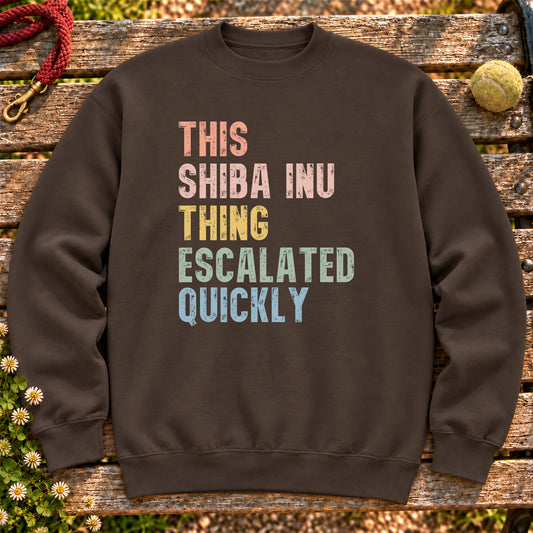 “This Shiba Inu thing escalated quickly” text on a Dark Chocolate sweatshirt