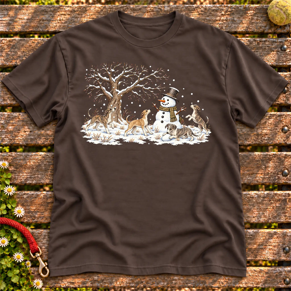 Whippet puppies playing in snow with a snowman on a Dark Chocolate T-shirt