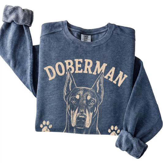 Denim Comfort Colors® sweatshirt featuring Alert, Elegant & Slightly Intimidating - Doberman, folded presentation