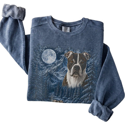 Folded denim sweatshirt with American Bulldog Winter Moon artwork.