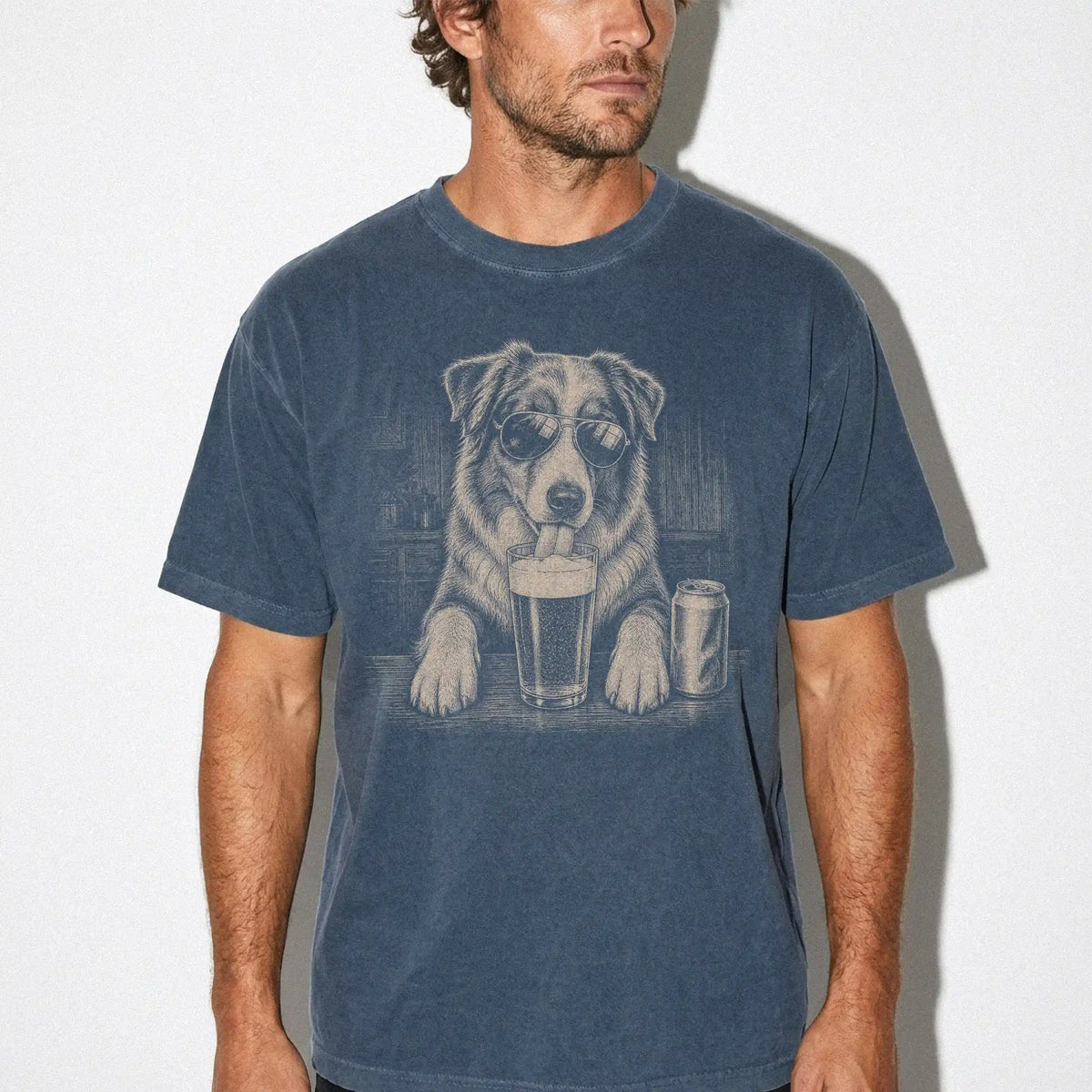 Model wearing a Denim Comfort Colors® t-shirt with Australian Shepherd sneaking a drink from a pint