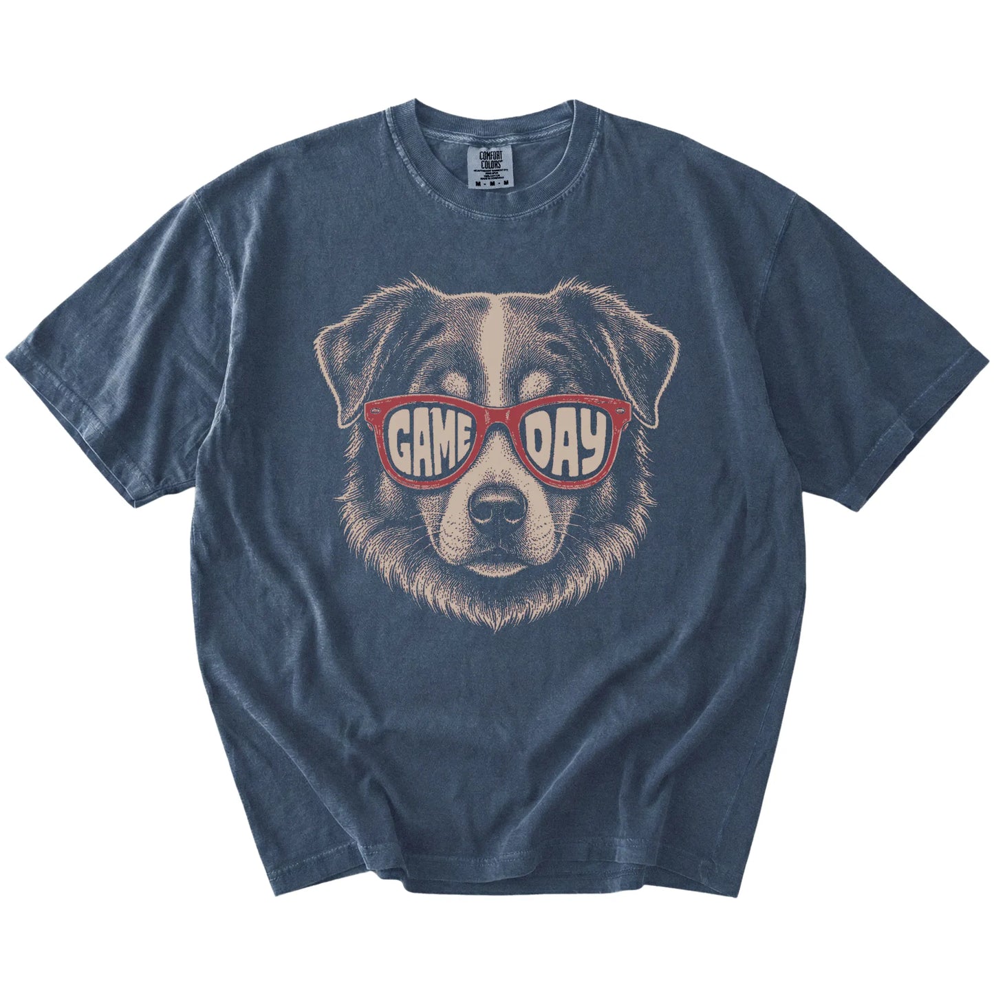 Australian Shepherd wearing red Game Day sunglasses on a Denim Comfort Colors® T-shirt