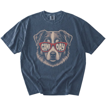 Australian Shepherd wearing red Game Day sunglasses on a Denim Comfort Colors® T-shirt