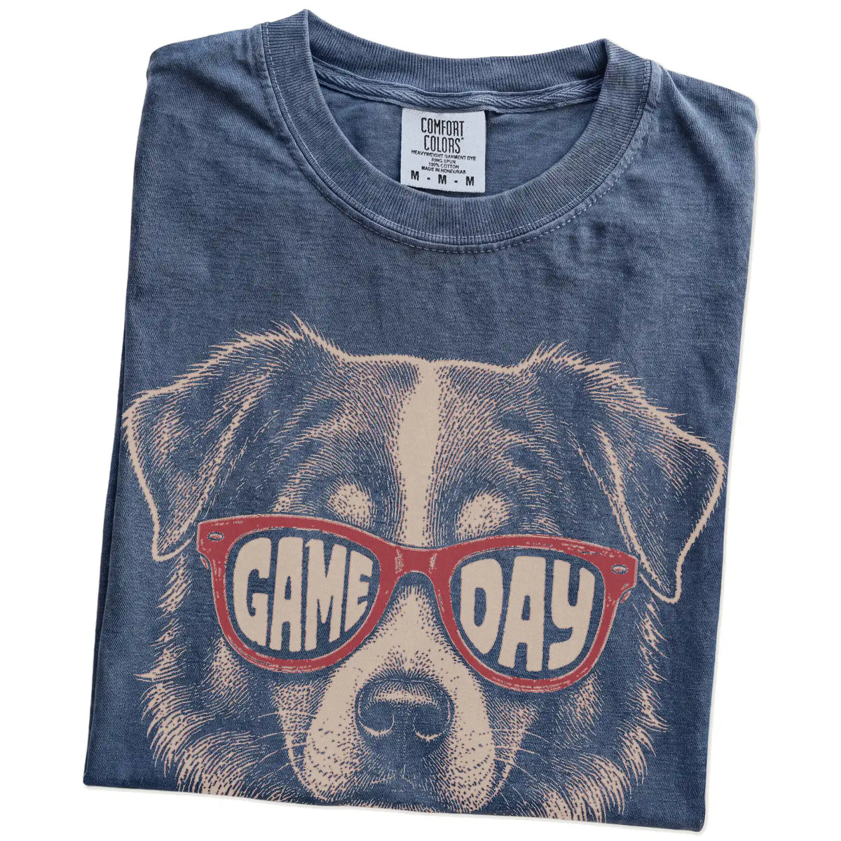 Folded Denim Comfort Colors® T-shirt showing australian shepherd wearing red game day sunglasses