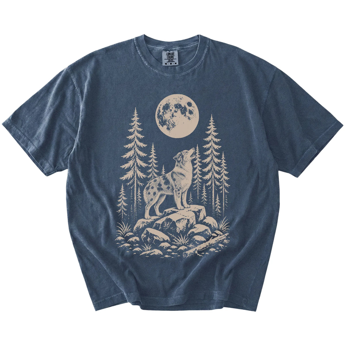 Australian Shepherd howling beneath the moon and pine trees on a Denim Comfort Colors® T-shirt