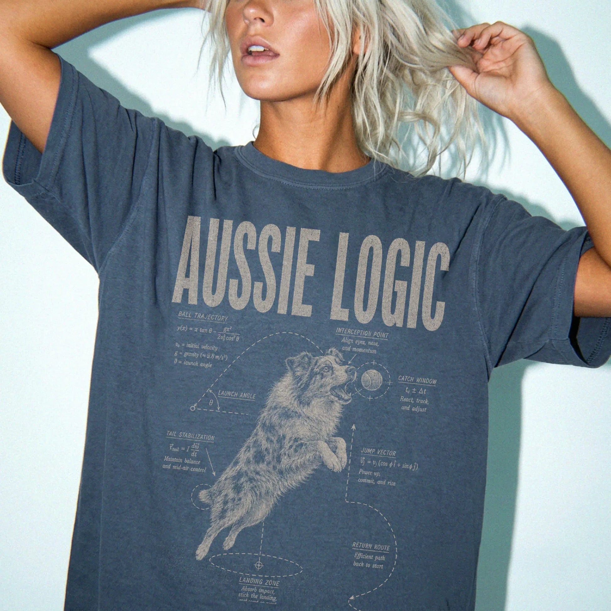 Woman wearing a Denim Australian Shepherd Logic T-Shirt