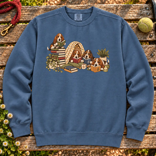 Basset Hound puppies reading books in a cozy blanket fort on a Denim sweatshirt