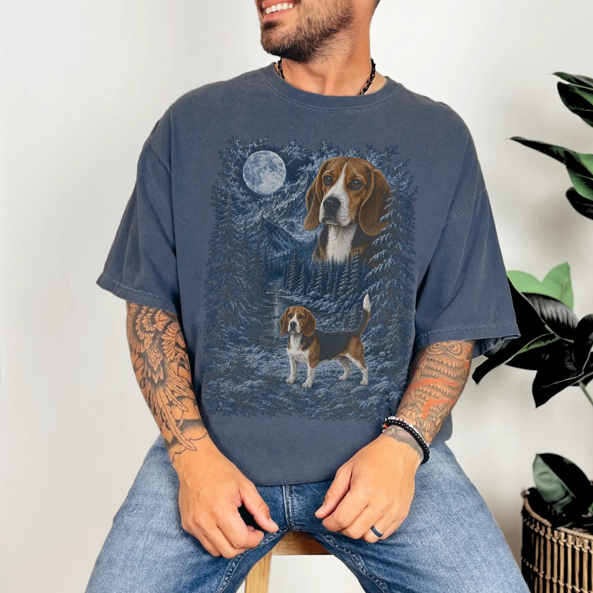 Model wearing a denim T-shirt with Beagle Winter Moon artwork.
