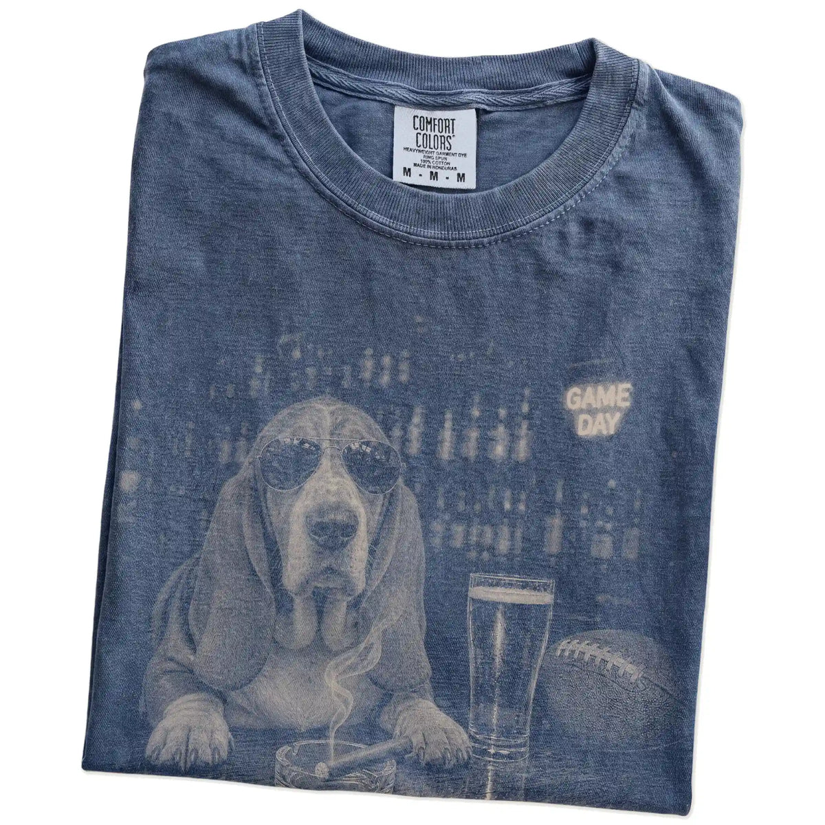 Folded Denim Comfort Colors® T-shirt showing Basset Hound with beer and football graphics