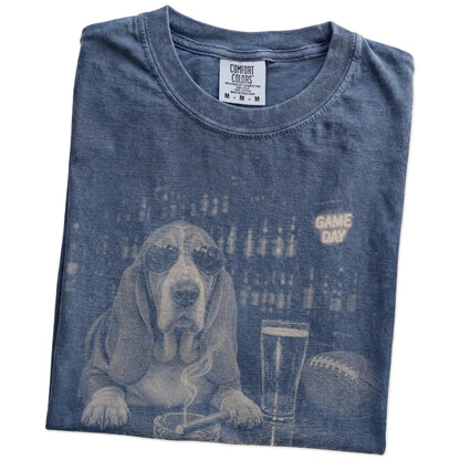 Folded Denim Comfort Colors® T-shirt showing Basset Hound with beer and football graphics