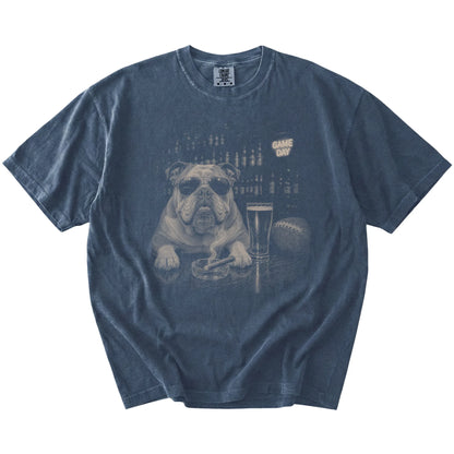 Bulldog with beer and football graphics on a Denim Comfort Colors® T-shirt