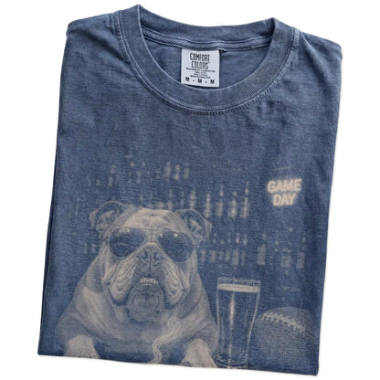 Folded Denim Comfort Colors® T-shirt showing Bulldog with beer and football graphics