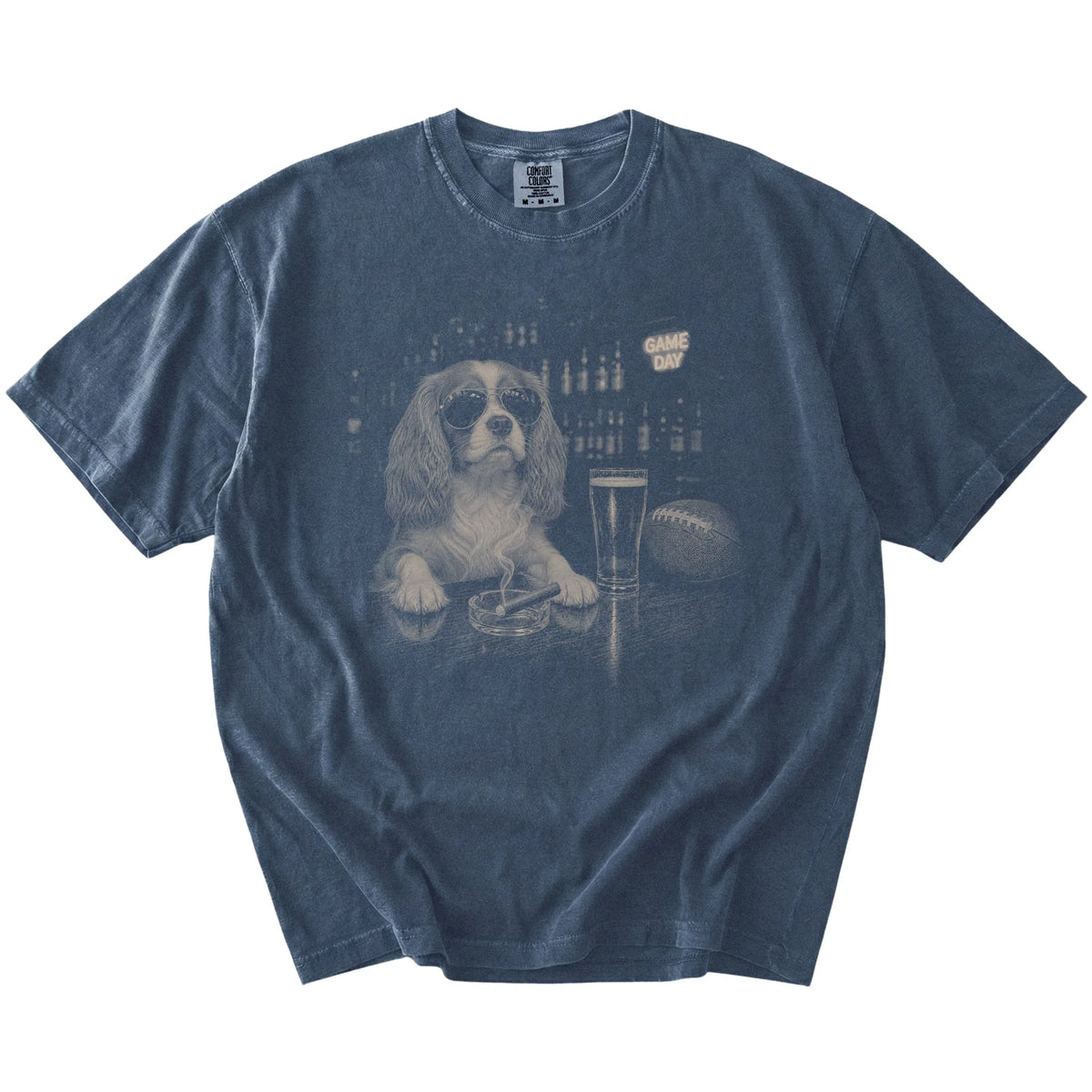 Cavalier King Charles Spaniel with beer and football graphics on a Denim Comfort Colors® T-shirt