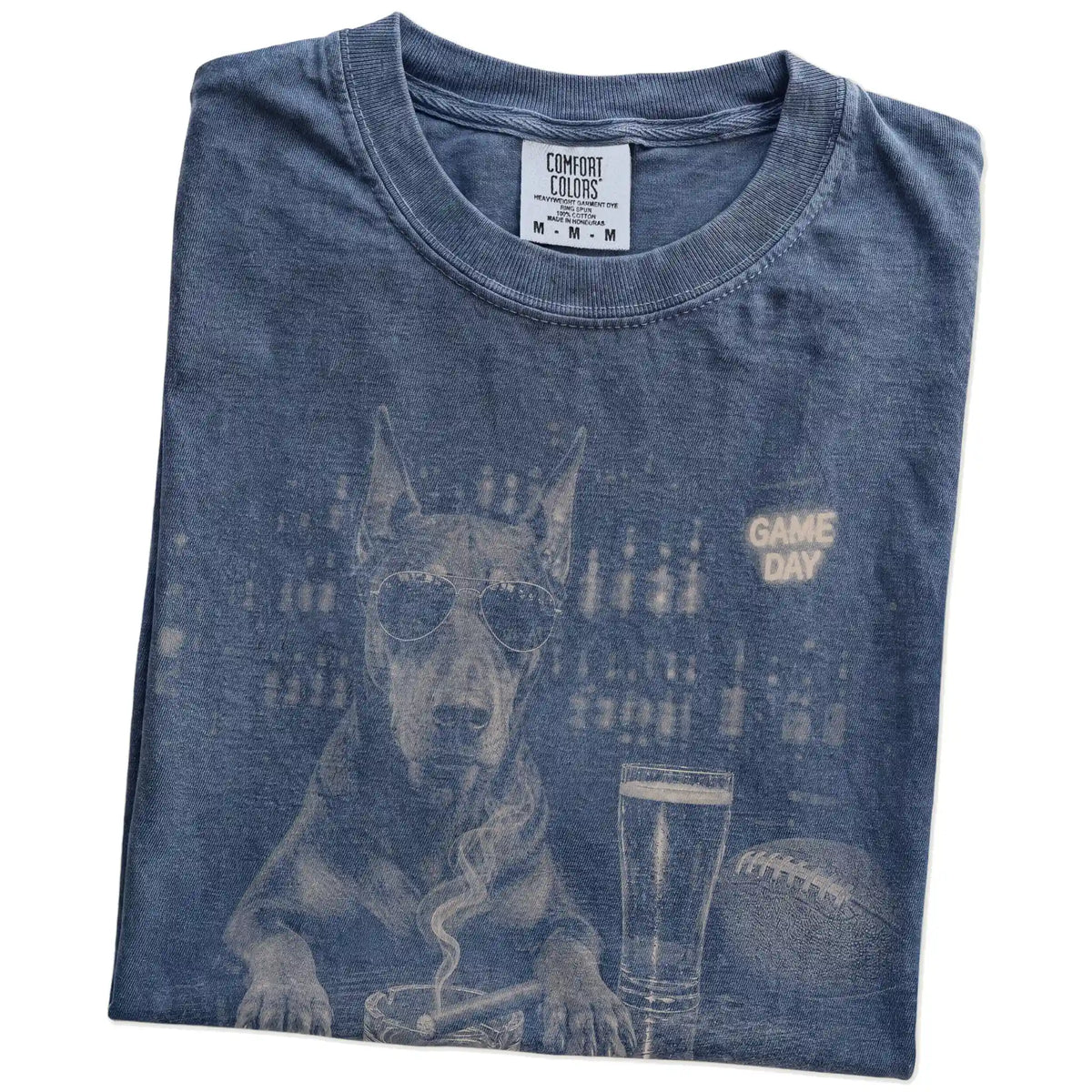 Folded Denim Comfort Colors® T-shirt showing Doberman with beer and football graphics