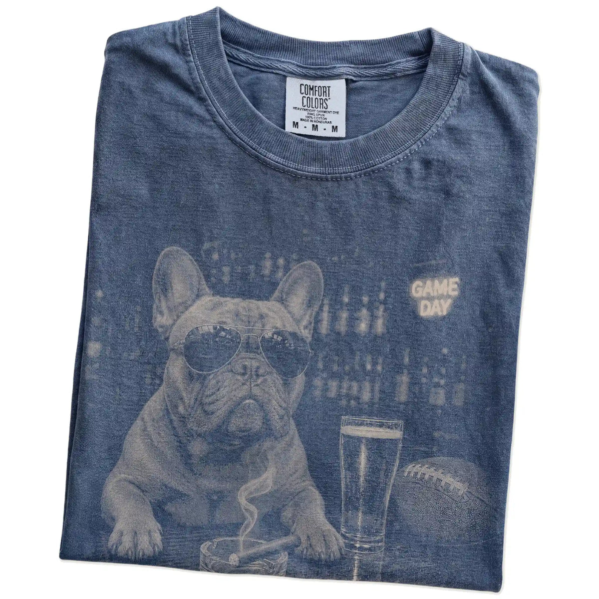 Folded Denim Comfort Colors® T-shirt showing French Bulldog with beer and football graphics