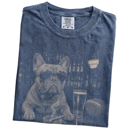 Folded Denim Comfort Colors® T-shirt showing French Bulldog with beer and football graphics