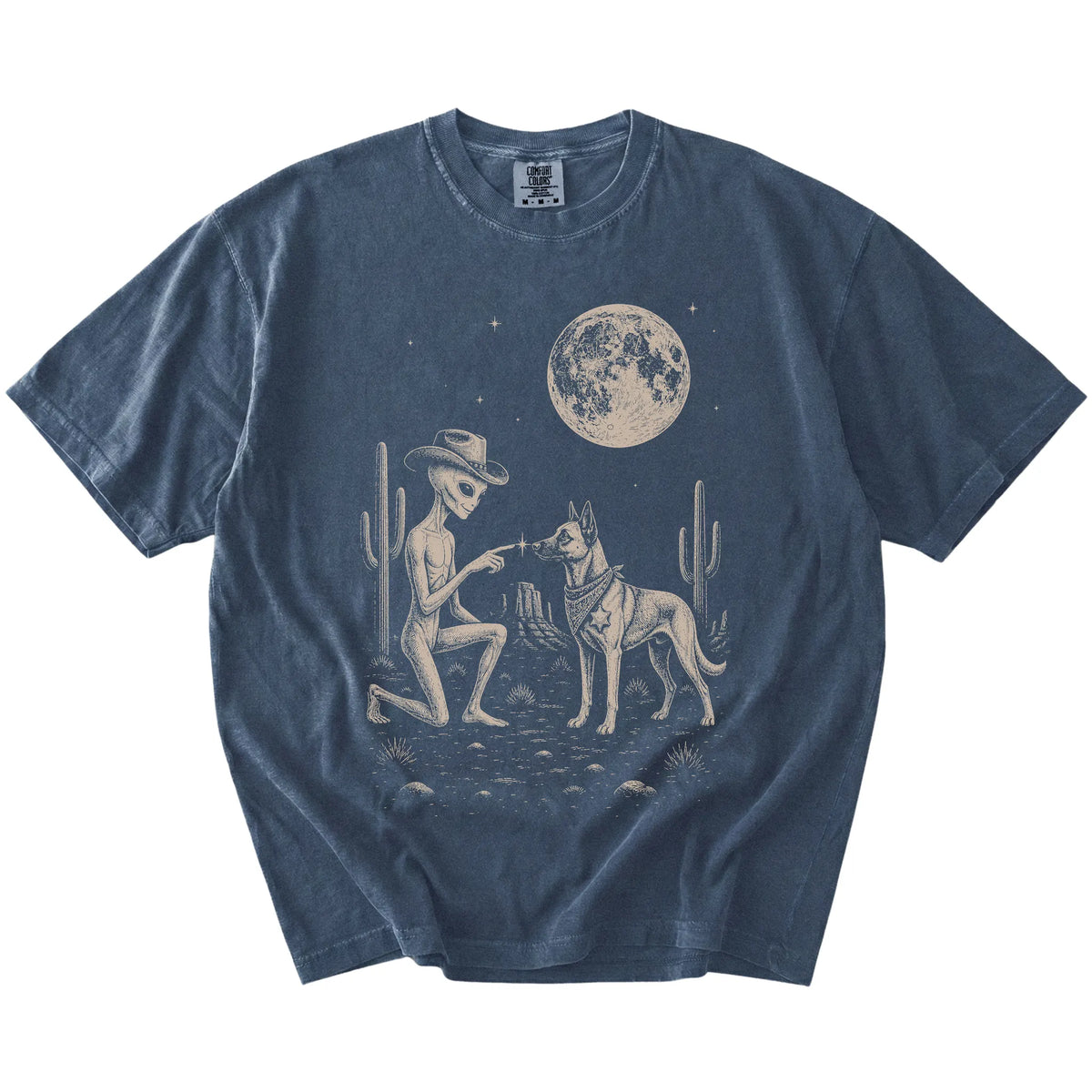 Cowboy alien fist-bumping a Belgian Malinois beneath the moon on a Denim Comfort Colors® T-shirt