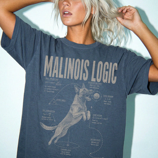 Woman wearing a Denim Belgian Malinois Ball Logic T-Shirt